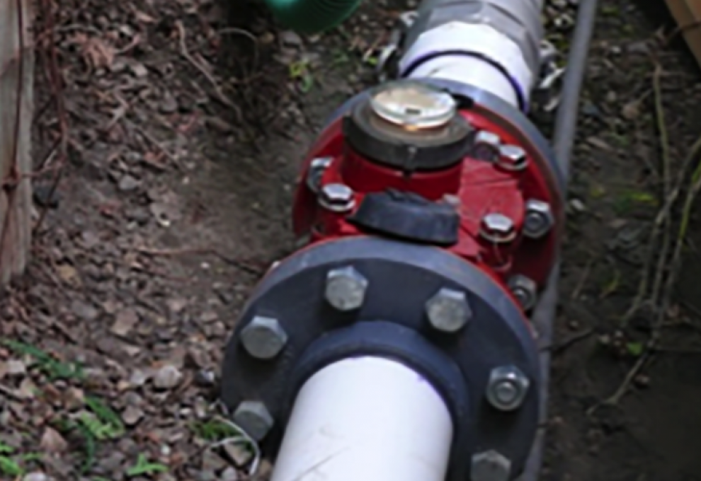 Water meter, monitoring flow in drip irrigation system.