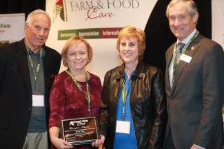 The Brant County Agricultural Awareness Committee was awarded the Farm & Food Care Champion Award for 2019. Farm & Food Care past chair Bruce Christie (left) and current board member Crispin Colvin (right) presented the award to committee members Barbara Sheardown and Jayne Miller.