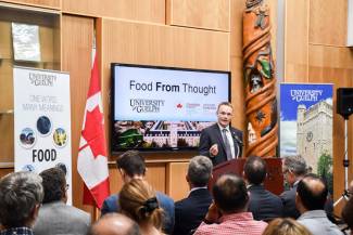 Professor Evan Fraser speaks at the Food from Thought announcement at the University of Guelph.