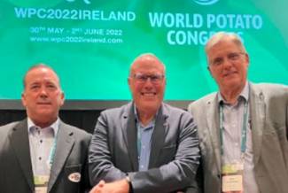 Retiring Romain Cools (middle) is flanked by the new World Potato Congress president and CEO John Griffin, (L) and Dr. Peter Vander Zaag, vice-president, on the right.
