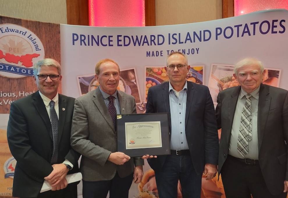 L-R: Greg Donald, general manager, PEI Potato Board, Kevin MacIsaac, retired general manager United Potato Growers of Canada, John Visser, chair PEI Potato Board  and Ray Keenan, president, United Potato Growers of Canada.  