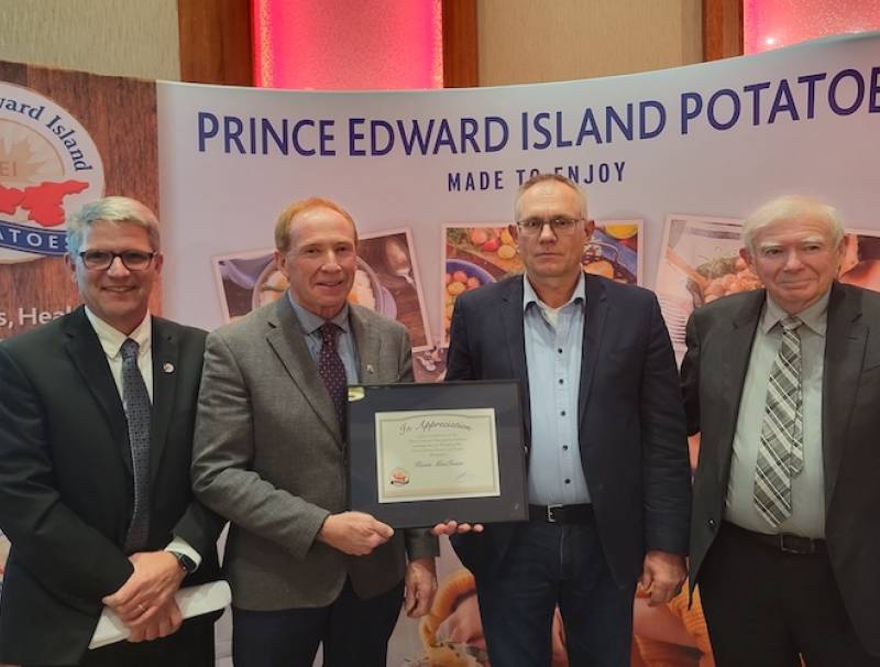 L-R: Greg Donald, general manager, PEI Potato Board, Kevin MacIsaac, retired general manager United Potato Growers of Canada, John Visser, chair PEI Potato Board  and Ray Keenan, president, United Potato Growers of Canada.  